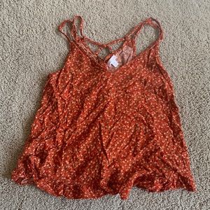 Orange flower cropped tank top with tied back and adjustable straps